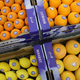Citrus in boxes at grocery store